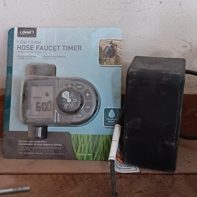 Orbit Hose Faucet Timer new in the pack, and a Malibu timer