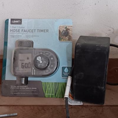 Orbit Hose Faucet Timer new in the pack, and a Malibu timer