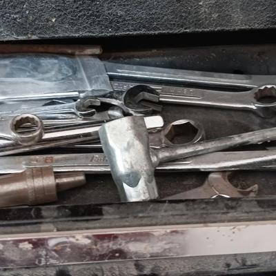 Old Craftsman toolbox with an assortment of tools