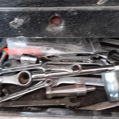 Old Craftsman toolbox with an assortment of tools