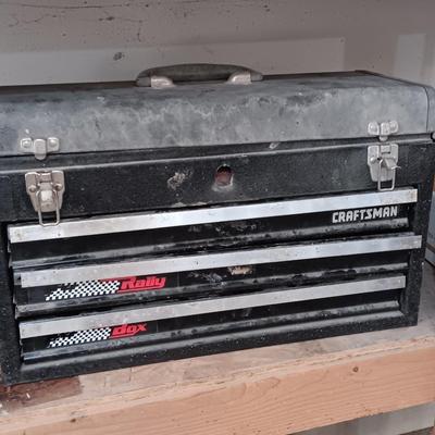 Old Craftsman toolbox with an assortment of tools