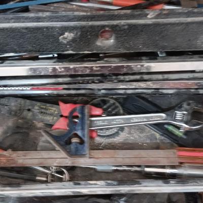 Old Craftsman toolbox with an assortment of tools