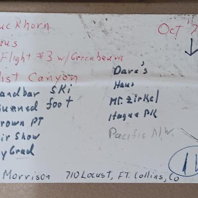 Six metal slide boxes full of slides from various travels