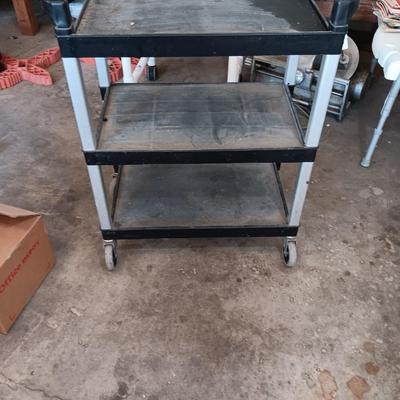 Continental Mfg. Food service three shelved cart with dual handles