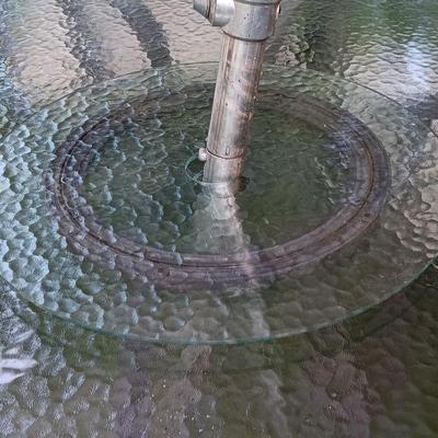 Patio set with table, six chairs and umbrella