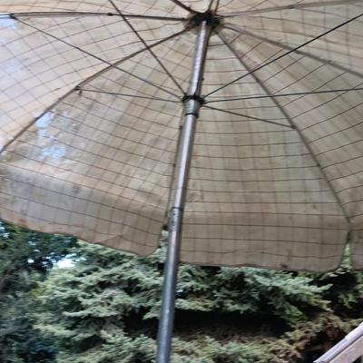 Patio set with table, six chairs and umbrella