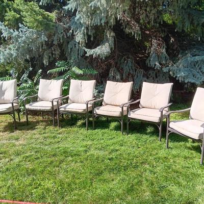 Patio set with table, six chairs and umbrella