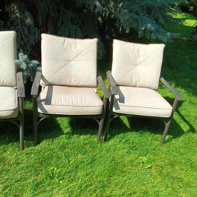 Patio set with table, six chairs and umbrella