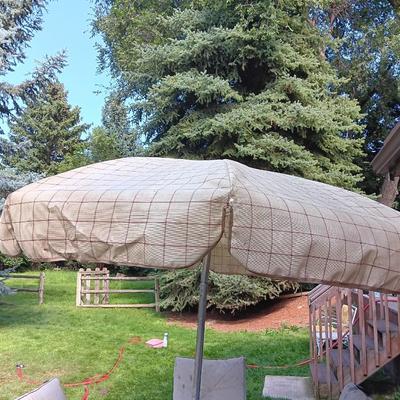 Patio set with table, six chairs and umbrella