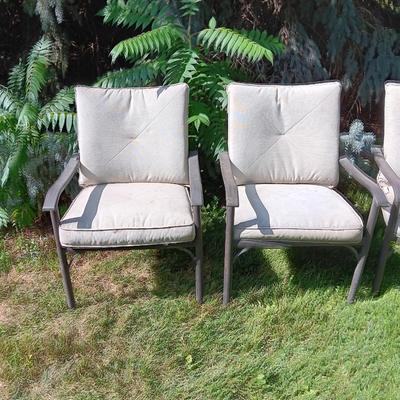 Patio set with table, six chairs and umbrella