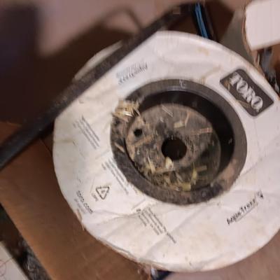 Roll of Toro Aqua-Traxx with the PBX Advantage Drip tape with small box of plumbing supplies