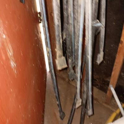 Box of misc. plumbing supplies with a bunch of hoses and water line items Small new roll of blue PEX pipe