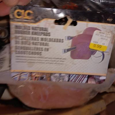 Box of misc. plumbing supplies with a bunch of hoses and water line items Small new roll of blue PEX pipe