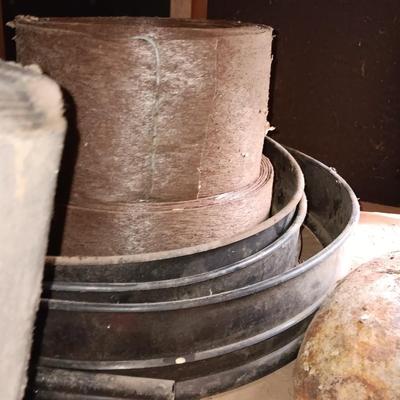 Two big rolls of weed barrier Garden fabric - lawn edging - and bag of lawn winterizer and mulch