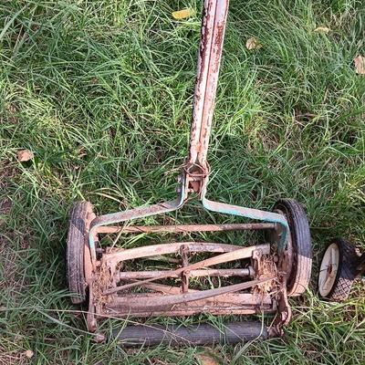 Vintage metal Push mower yard decor with Scott's easy green spreader