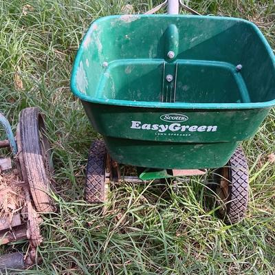 Vintage metal Push mower yard decor with Scott's easy green spreader
