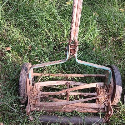 Vintage metal Push mower yard decor with Scott's easy green spreader