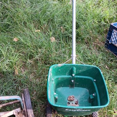 Vintage metal Push mower yard decor with Scott's easy green spreader