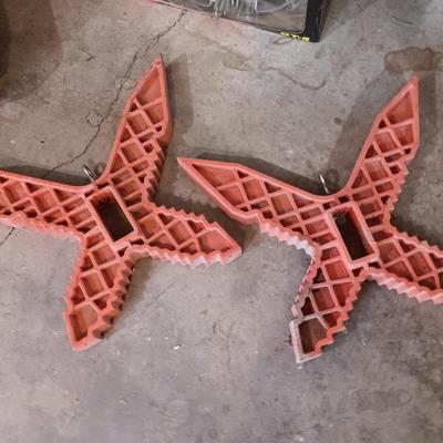 Two hanging butterfly shaped extention cord holders