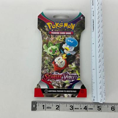 -188- POKÃ‰MON | Three Unopened PokÃ©mon Card Packs