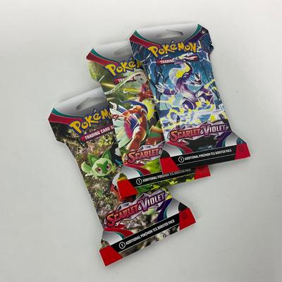 -188- POKÃ‰MON | Three Unopened PokÃ©mon Card Packs