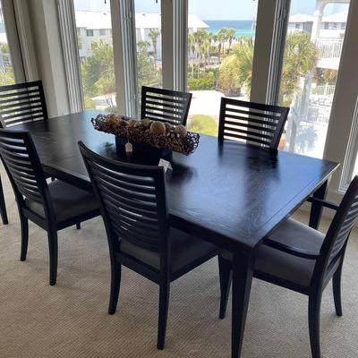Unique black dining room table w/ six chairs