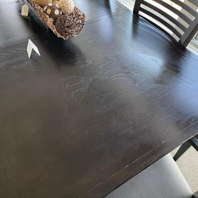 Unique black dining room table w/ six chairs