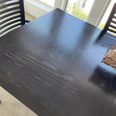 Unique black dining room table w/ six chairs