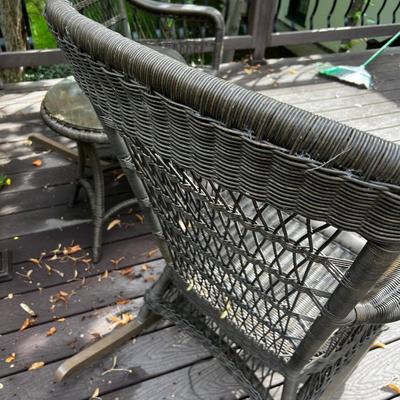 A Wicker Set of Rocking Chairs and table