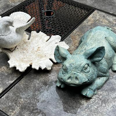 2 pieces of yard art. Resin Pig and a dove