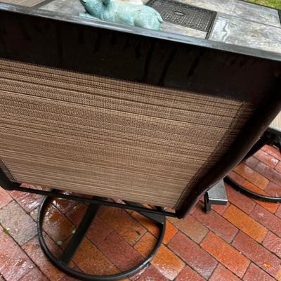 Patio Table with 4 Swivel Chairs. 