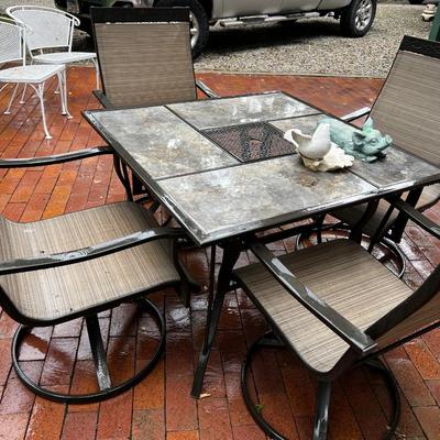 Patio Table with 4 Swivel Chairs. 