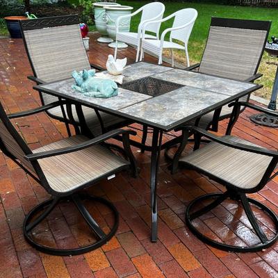 Patio Table with 4 Swivel Chairs. 