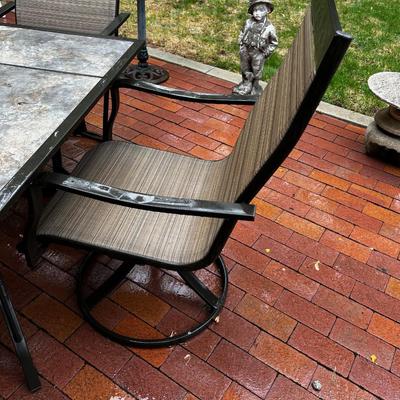 Patio Table with 4 Swivel Chairs. 