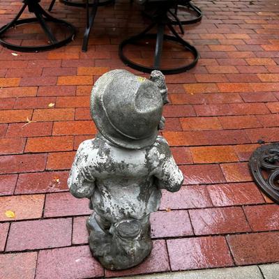CONCRETE Boy with the Puppies statue.