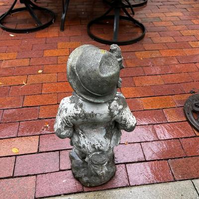 CONCRETE Boy with the Puppies statue.