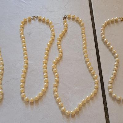 Varying Length Pearl Necklaces
