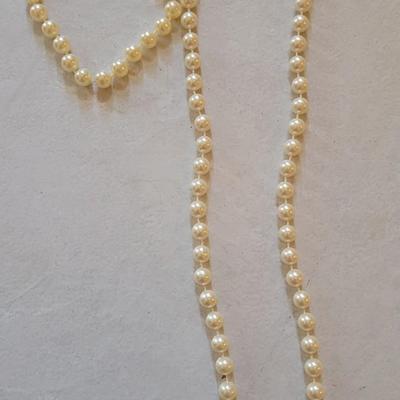 Varying Length Pearl Necklaces