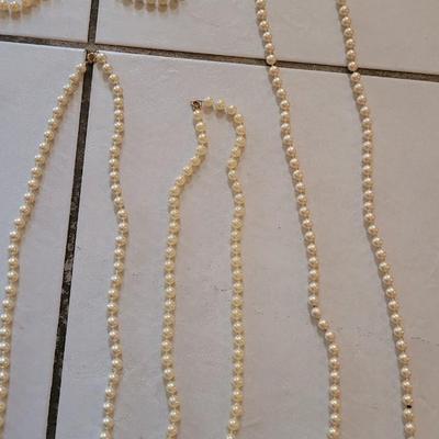 Varying Length Pearl Necklaces