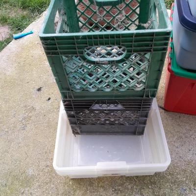 Storage totes with lids, and a few plastic milk crates