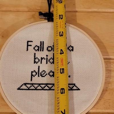 Cross Stitched "Fall Off A Bridge Please" by Local Artist