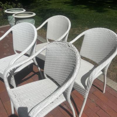 4 White Patio Chairs by Frontgate.