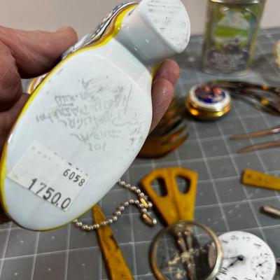 Dresser Top Items: Watch, Talcum Power, Nail Set, Makeup Jars etc.