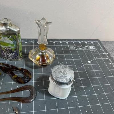 Dresser Top Items: Watch, Talcum Power, Nail Set, Makeup Jars etc.