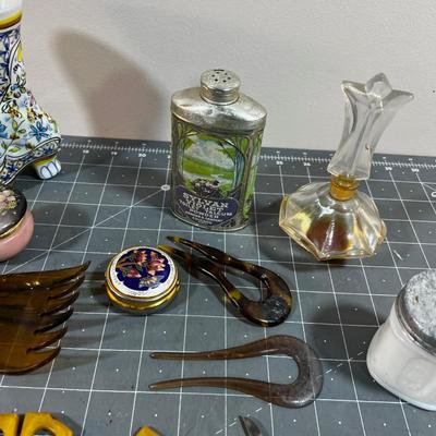 Dresser Top Items: Watch, Talcum Power, Nail Set, Makeup Jars etc.