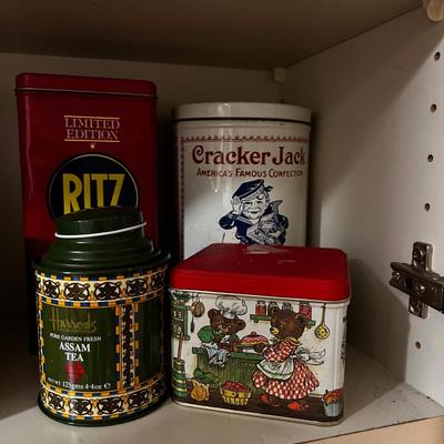 2 Shelves of Decorative Collectible Tins