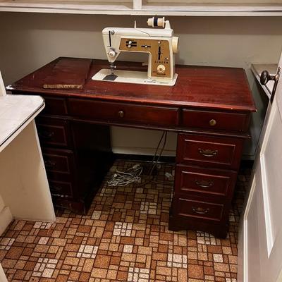 B - Singer Sewing Machine in Desk Top Cabinet. 