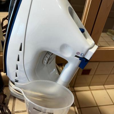 UP -- Steam Iron and Starch. 