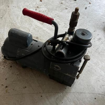 GARAGE -- Vacuum Pump 