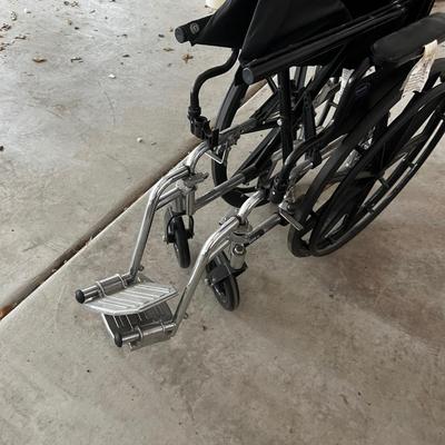 GARAGE -- Invacare Wheel Chair. 